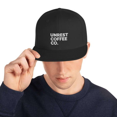 Unrest Coffee Snapback Hat 3 by Unrest Coffee in Hampden Maine
